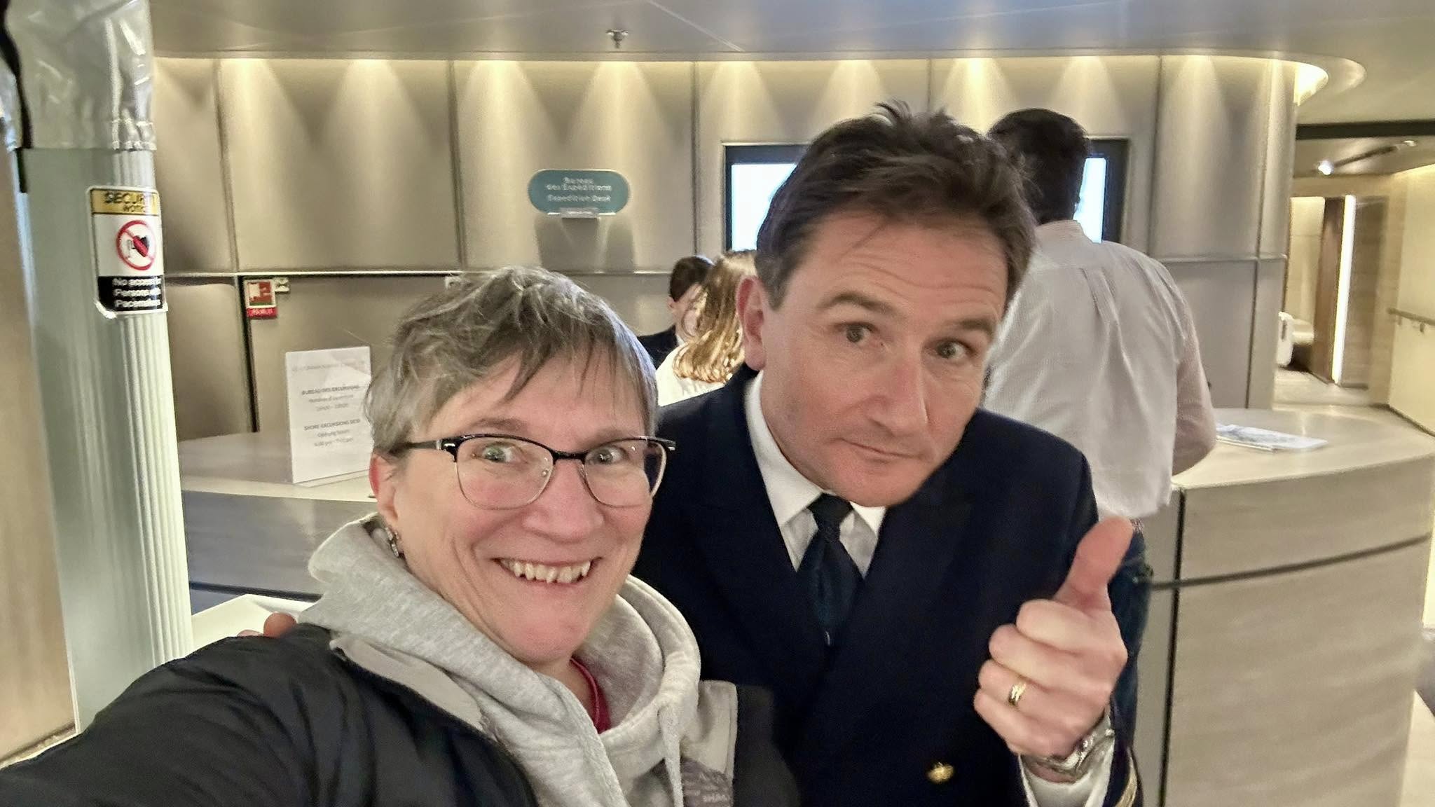 Sheila Gallant-Halloran with Captain Patrick Marchesseau aboard Ponant's Le Commandant Charcot luxury icebreaker.