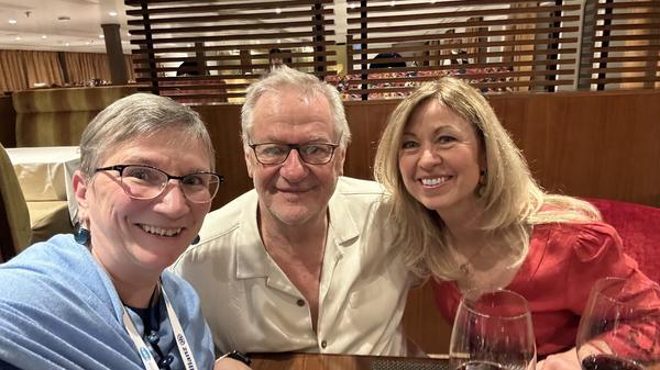 Sheila Gallant-Halloran dining with Rudi Schriner and Kristin Karst of AmaWaterways aboard a river ship.