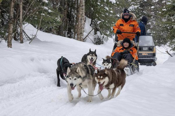 Sheila Gallant-Halloran with her niece dog-sledding off an expedition cruise with Ponant Expeditions.